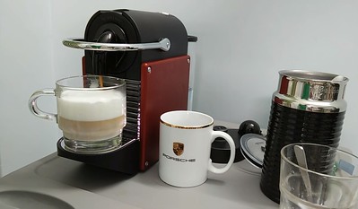 A Coffee making machine and mugs