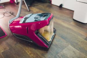 cleaning appliance tank filled with soapy water