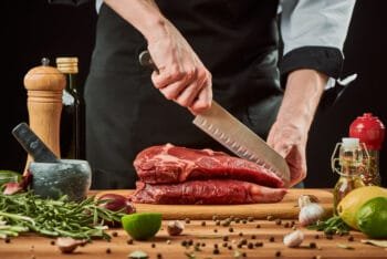 slicing meat with a santoku knife