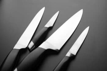 stainless steel blades with black handles